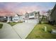 Attractive two-story home with a two-car garage, complemented by a green lawn and sidewalk at 436 Rowley Ln, Summerville, SC 29486