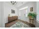 Inviting foyer featuring wood floors, a decorative rug, and a console table at 436 Rowley Ln, Summerville, SC 29486
