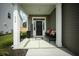 Charming covered front porch with decorative accents, offering a warm welcome to the home at 436 Rowley Ln, Summerville, SC 29486