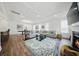 Spacious living room featuring coffered ceilings, fireplace, and hardwood floors at 436 Rowley Ln, Summerville, SC 29486