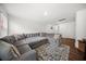 Spacious living room boasts a large sectional sofa, natural light, and a modern rug at 436 Rowley Ln, Summerville, SC 29486