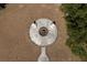 Overhead view of firepit featuring two Adirondack chairs in grassy backyard at 6118 Hazelhurst Ln, Ravenel, SC 29470