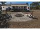 Fire pit area surrounded by chairs, perfect for outdoor gatherings and relaxation at 6118 Hazelhurst Ln, Ravenel, SC 29470