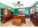Bright bedroom with a large dresser and a chest at the foot of the bed at 6118 Hazelhurst Ln, Ravenel, SC 29470