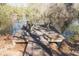 Waterfront dock with seating; a peaceful outdoor retreat at 6118 Hazelhurst Ln, Ravenel, SC 29470