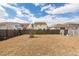 Spacious fenced-in backyard with healthy grass, offering privacy and room for outdoor activities at 613 Zinnia Dr, Goose Creek, SC 29445