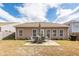 A backyard area complete with patio and patio furniture at 613 Zinnia Dr, Goose Creek, SC 29445
