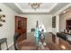 A dining room featuring a glass table, a decorative hutch, and ample seating at 613 Zinnia Dr, Goose Creek, SC 29445