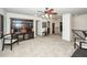 Upstairs living space features an entertainment center, comfy seating, ceiling fan and hallway at 613 Zinnia Dr, Goose Creek, SC 29445