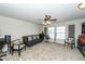 Spacious living room with neutral tones, complemented by natural light and comfortable seating at 613 Zinnia Dr, Goose Creek, SC 29445