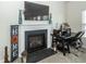 Comfortable living room with fireplace, TV, and home decor at 613 Zinnia Dr, Goose Creek, SC 29445