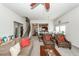 Inviting living area with plush seating, staircase, and an open view to the dining and kitchen area at 613 Zinnia Dr, Goose Creek, SC 29445