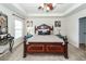 Spacious main bedroom with ceiling fan, elegant furniture, and stylish decor at 613 Zinnia Dr, Goose Creek, SC 29445