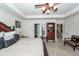 Spacious main bedroom featuring tray ceilings, neutral carpet, and wood furniture at 613 Zinnia Dr, Goose Creek, SC 29445