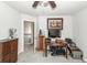 A well lit office space with desk and storage at 613 Zinnia Dr, Goose Creek, SC 29445
