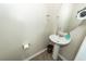 Cozy powder room featuring a pedestal sink and classic fixtures at 613 Zinnia Dr, Goose Creek, SC 29445