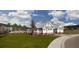 Community pool house with attractive landscaping, community pool and outdoor shower at 5215 Cottage Lndg Dr, Summerville, SC 29485