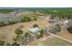 An aerial view of the property highlighting the landscaping, neighboring buildings, and exterior details at 732 Lindhaven Dr, Pineville, SC 29468