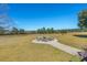 Expansive backyard with a fire pit and circle of chairs, ideal for outdoor gatherings and relaxation at 732 Lindhaven Dr, Pineville, SC 29468
