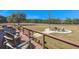 Backyard showcasing a wooden deck with chairs overlooking a fire pit with chairs at 732 Lindhaven Dr, Pineville, SC 29468