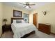 Cozy bedroom with a bed, wooden furniture, and a window that fills the room with natural light at 732 Lindhaven Dr, Pineville, SC 29468