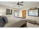 Comfortable bedroom with a ceiling fan, neutral colors, and en-suite bathroom at 732 Lindhaven Dr, Pineville, SC 29468