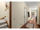 Hallway with stairs and multiple doors, with access to a shower visible at 732 Lindhaven Dr, Pineville, SC 29468