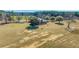 Expansive aerial view of home with sprawling yard, mature trees, and a fire pit area for outdoor enjoyment at 732 Lindhaven Dr, Pineville, SC 29468