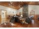 Comfortable living room boasts a stone fireplace, hardwood floors, and a relaxed seating arrangement at 732 Lindhaven Dr, Pineville, SC 29468