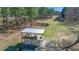 Elevated shooting platform overlooks the shooting range, surrounded by natural woodland for a secluded experience at 732 Lindhaven Dr, Pineville, SC 29468