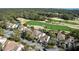 Beautiful aerial view of villas backing onto a lush golf course and wooded area at 747 Spinnaker Beachhouse, Seabrook Island, SC 29455