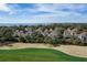 Scenic aerial view of elegant homes near a golf course, backing onto ocean, offering serene coastal living at 747 Spinnaker Beachhouse, Seabrook Island, SC 29455