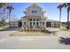 Charming barn office with a central entrance, surrounded by horse stalls and manicured landscaping at 747 Spinnaker Beachhouse, Seabrook Island, SC 29455