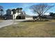 Sprawling equestrian estate with manicured grounds, stables, and a luxurious home, ideal for horse lovers at 747 Spinnaker Beachhouse, Seabrook Island, SC 29455