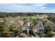 Charming two-story homes with palm trees and golf course views, offering a serene and picturesque setting at 747 Spinnaker Beachhouse, Seabrook Island, SC 29455