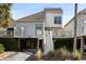 Charming two-story home featuring a private balcony and well-maintained landscaping at 747 Spinnaker Beachhouse, Seabrook Island, SC 29455