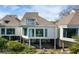View of the house showcasing private balconies and stilt construction to elevate the home at 747 Spinnaker Beachhouse, Seabrook Island, SC 29455
