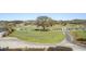 Picturesque golf course with lush green fairways, mature trees, and players enjoying the game at 747 Spinnaker Beachhouse, Seabrook Island, SC 29455