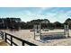 Spacious outdoor horse arena, perfect for equestrian activities and training, surrounded by lush greenery at 747 Spinnaker Beachhouse, Seabrook Island, SC 29455