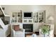 Inviting living room featuring a fireplace, built-in bookshelves, and comfortable seating, perfect for relaxation at 747 Spinnaker Beachhouse, Seabrook Island, SC 29455