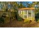 Outdoor shed providing extra storage space, surrounded by a lush green yard at 749 Sprague St, Charleston, SC 29412