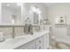 Bright bathroom featuring a double vanity with drawers and cabinetry for storage and decor at 779 Hamlet Cir, Goose Creek, SC 29445
