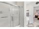 Bathroom featuring large tub and glassed-in shower, next to bedroom at 779 Hamlet Cir, Goose Creek, SC 29445