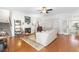 Comfortable living room featuring a fireplace, hardwood floors, and ample natural light at 779 Hamlet Cir, Goose Creek, SC 29445