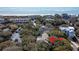 Aerial shot showcasing the home's location near the beach and surrounding neighborhood at 8 Fairway Oaks Ln, Isle of Palms, SC 29451