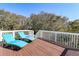Relax on the sun deck in these two deck chairs with a view of the trees at 8 Fairway Oaks Ln, Isle of Palms, SC 29451