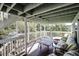 This spacious deck offers shade from the sun and ample seating at 8 Fairway Oaks Ln, Isle of Palms, SC 29451