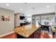 Kitchen with island and stainless steel appliances at 8 Fairway Oaks Ln, Isle of Palms, SC 29451