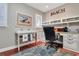 The well lit office space includes an integrated sink, workspace and beautiful hardwood floors at 8 Fairway Oaks Ln, Isle of Palms, SC 29451