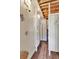 Nautical-themed outdoor shower stalls with wooden floors and charming decor at 8 Fairway Oaks Ln, Isle of Palms, SC 29451